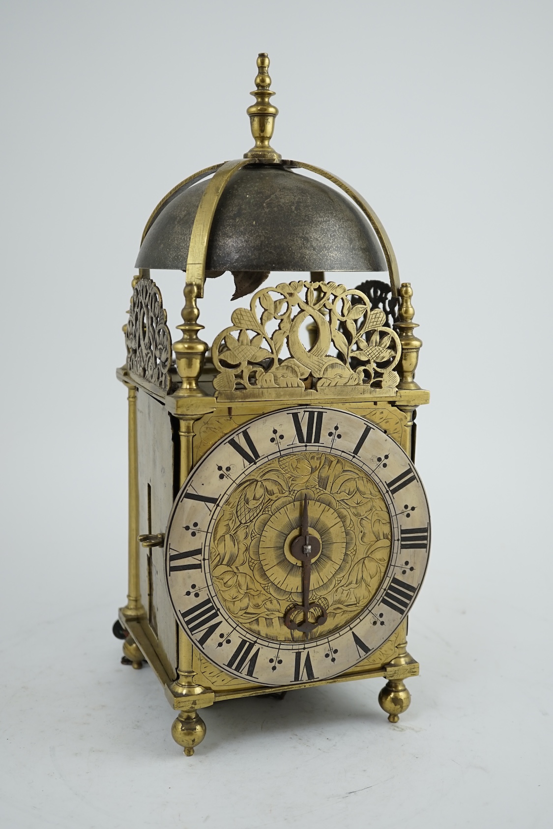 A late 17th century brass lantern clock